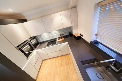 Design ideas for a modern kitchen in Wiltshire.