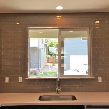 KITCHEN - Backsplash - Brown Glass Subway tile / Counter-to-Ceiling @ Window