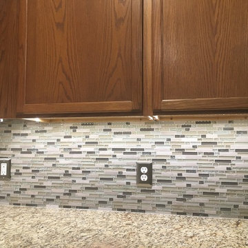 Kitchen Backsplash - Linear Mosaic and Glass with Santa Cecilia Granite Counter