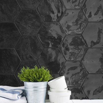 Kitchen backsplash with glossy black hexagon tile