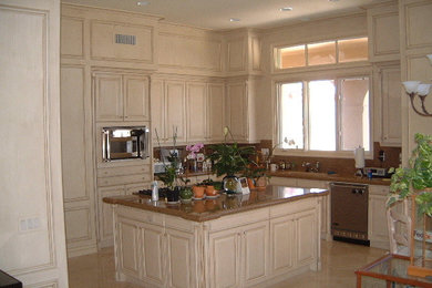 Kitchen cabinets with cream and coffee glazed finish