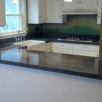 Kitchen countertop w/metal art backsplash