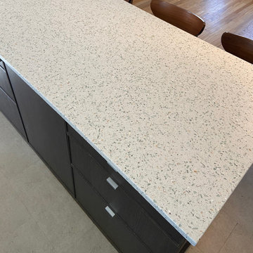 Kitchen countertops featuring Curava recycled glass surfaces in Savaii