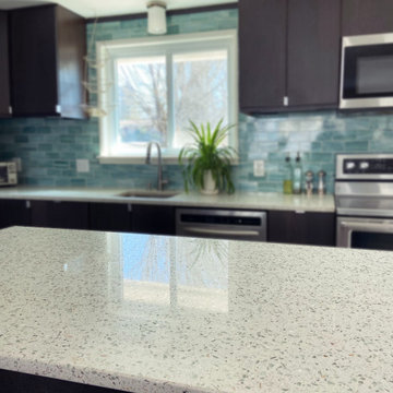 Kitchen countertops featuring Curava recycled glass surfaces in Savaii