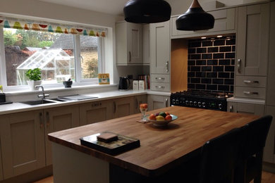 Medium sized traditional kitchen/diner in Other with shaker cabinets, grey cabinets, quartz worktops and an island.