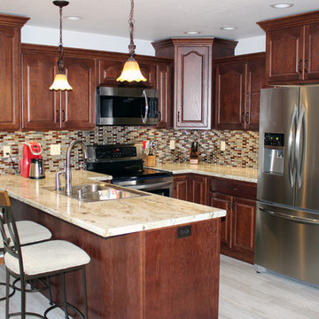Kitchen Design: StarMark Cabinetry in Oak Royale, HD Formica Countertop