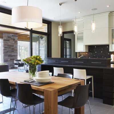 Inspiration for a large modern single-wall eat-in kitchen remodel in Toronto with glass-front cabinets, multicolored backsplash, mosaic tile backsplash, white cabinets, stainless steel appliances and an island