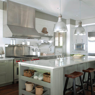 Traditional kitchen remodeling - Kitchen - traditional kitchen idea in Atlanta with stainless steel appliances, a farmhouse sink, recessed-panel cabinets, marble countertops and green cabinets