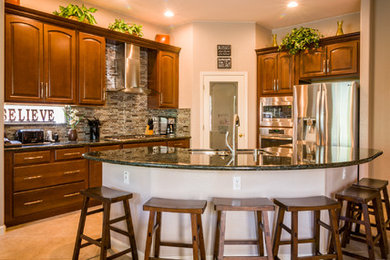 Mid-sized minimalist u-shaped ceramic tile and beige floor open concept kitchen photo in Sacramento with a double-bowl sink, raised-panel cabinets, medium tone wood cabinets, granite countertops, multicolored backsplash, matchstick tile backsplash, stainless steel appliances and a peninsula