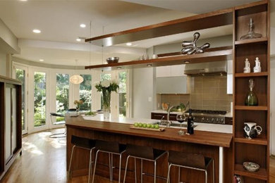 Kitchen featuring flyover shelves