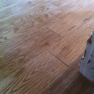 Kitchen floor tile...wood floor style...old home remodel