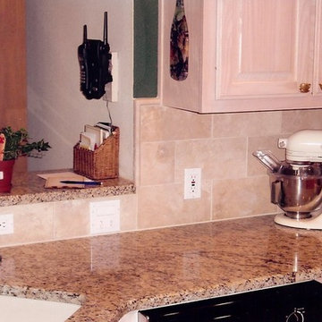 Kitchen - Granite Counter and Travertine Subway Tile