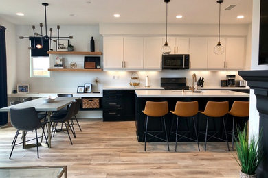 Inspiration for a mid-sized modern kitchen remodel in Orange County with an island