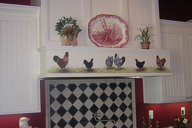 Example of a mid-sized cottage l-shaped enclosed kitchen design with louvered cabinets, white cabinets, marble countertops, multicolored backsplash, ceramic backsplash, stainless steel appliances and no island