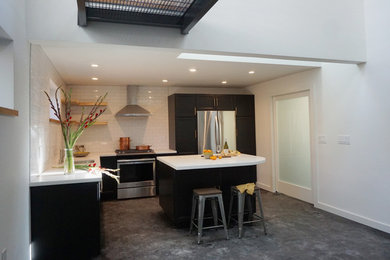 Eat-in kitchen - small modern u-shaped eat-in kitchen idea in San Francisco with shaker cabinets and an island