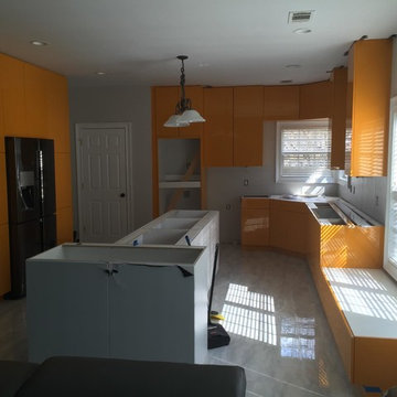 Kitchen Install in Progress:Modern Orange Gloss and White Gloss Kitchen Remodel