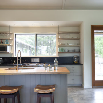 kitchen island with suspended shelves