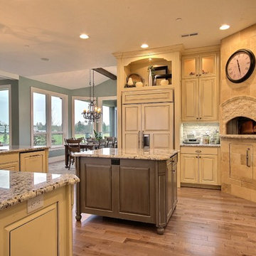 Kitchen Islands + Wood Fire Oven - The Party Palace - Custom Ranch on Acreage