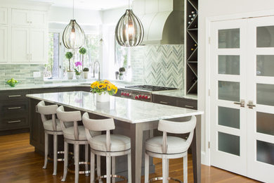 Inspiration for a mid-sized contemporary l-shaped medium tone wood floor eat-in kitchen remodel in Providence with an undermount sink, shaker cabinets, gray cabinets, marble countertops, multicolored backsplash, porcelain backsplash, stainless steel appliances and an island