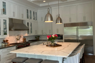 Example of a beach style kitchen design in Other