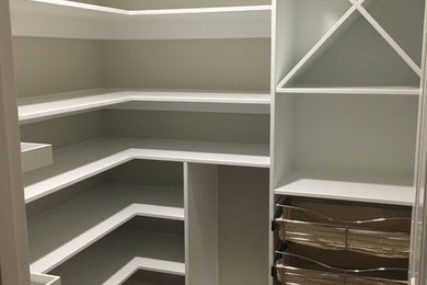 Example of a mid-sized classic u-shaped kitchen pantry design in Raleigh with open cabinets and white cabinets