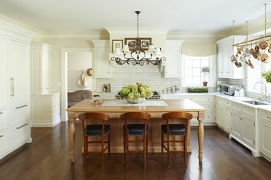 Inspiration for a timeless kitchen remodel in New York with recessed-panel cabinets and white cabinets