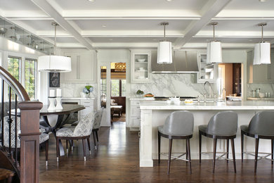 Example of a transitional galley eat-in kitchen design in New York with an undermount sink, glass-front cabinets, white cabinets, white backsplash, stone slab backsplash and marble countertops