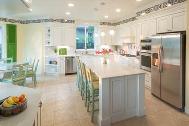 Eat-in kitchen - large contemporary u-shaped ceramic tile and beige floor eat-in kitchen idea in Other with a double-bowl sink, recessed-panel cabinets, white cabinets, marble countertops, white backsplash, marble backsplash, stainless steel appliances, an island and white countertops