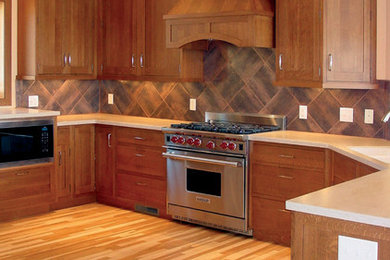 Kitchen - large traditional kitchen idea in Other with shaker cabinets, medium tone wood cabinets and multicolored backsplash