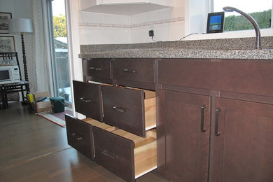 Eat-in kitchen - mid-sized contemporary eat-in kitchen idea in Seattle with shaker cabinets