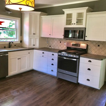 Kitchen Remodel Done With Painted Cabinets and A Laminate Countertop