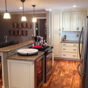 Kitchen Remodel, Flooring Install, Trim Install, Paint.
