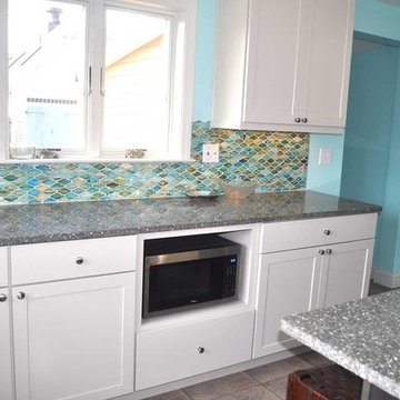 Kitchen Remodel in the Waves. Custom cabinetry includes built-in microwave.