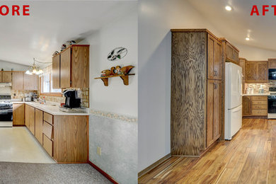 Example of a mid-sized classic u-shaped kitchen design in Milwaukee with shaker cabinets, medium tone wood cabinets, granite countertops and mosaic tile backsplash