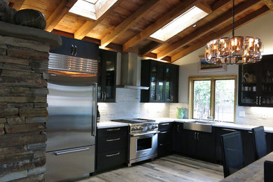 Example of a mountain style kitchen design in Orange County