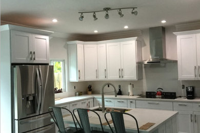 Example of a country kitchen design in Miami