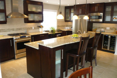 Eat-in kitchen - large contemporary l-shaped ceramic tile and beige floor eat-in kitchen idea in Ottawa with glass-front cabinets, dark wood cabinets, granite countertops, beige backsplash, matchstick tile backsplash, stainless steel appliances and an island