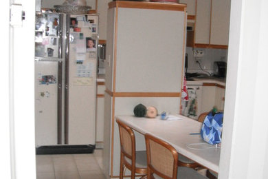 Example of a mid-sized cottage l-shaped kitchen design in Vancouver