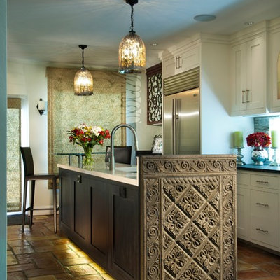 Tuscan eat-in kitchen photo in Miami with recessed-panel cabinets and white cabinets