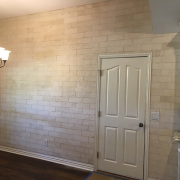 Kitchen Renovation - Limestone brick wall (before decor)