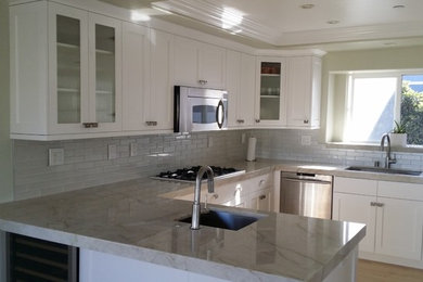 Kitchen Renovation of cabinets with full overlay and counter tops.