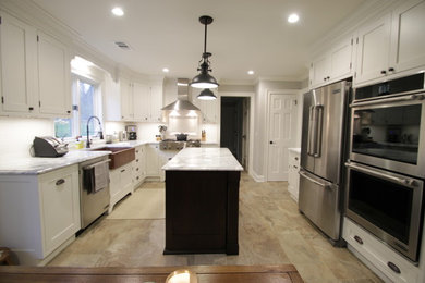 Eat-in kitchen - mid-sized traditional l-shaped porcelain tile eat-in kitchen idea in New York with a farmhouse sink, beaded inset cabinets, white cabinets, granite countertops, white backsplash, ceramic backsplash, stainless steel appliances and an island
