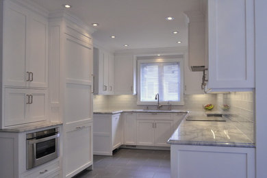 Kitchen - transitional kitchen idea in Montreal