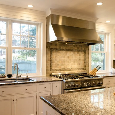 Elegant kitchen photo in Cincinnati with shaker cabinets, stainless steel appliances and granite countertops