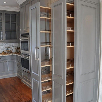Elegant kitchen photo in Columbus with raised-panel cabinets and gray cabinets