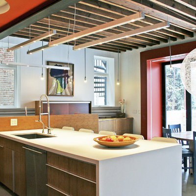 Trendy eat-in kitchen photo in Chicago with an undermount sink, flat-panel cabinets and medium tone wood cabinets