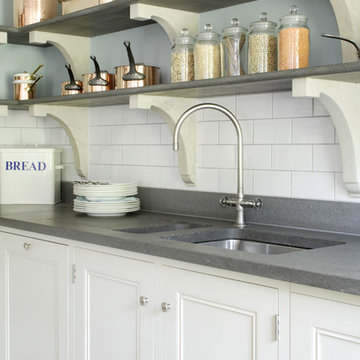 Kitchen tap with stone shelves