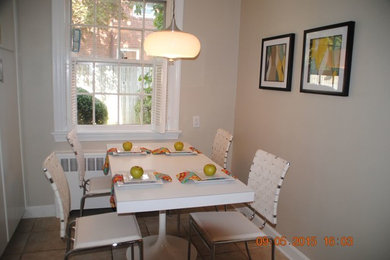 Example of a small transitional ceramic tile and beige floor kitchen/dining room combo design in Philadelphia
