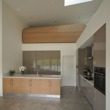 Kitchen using the sloping roof plane for height