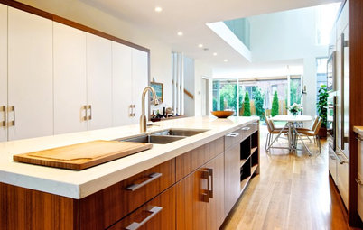 See How Wood Warms Modern White Kitchens